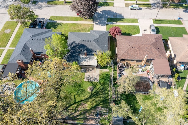 aerial view of residential area with a pool area