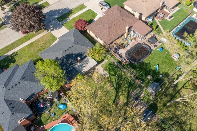 aerial view of residential area with a pool area