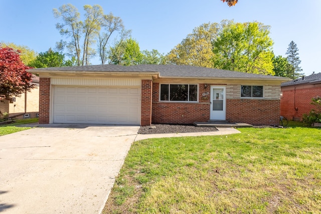 view of front of property with a garage, brick siding, and a front yard