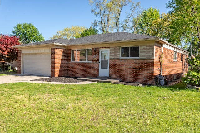 view of front of property featuring brick siding, an attached garage, driveway, and a front lawn