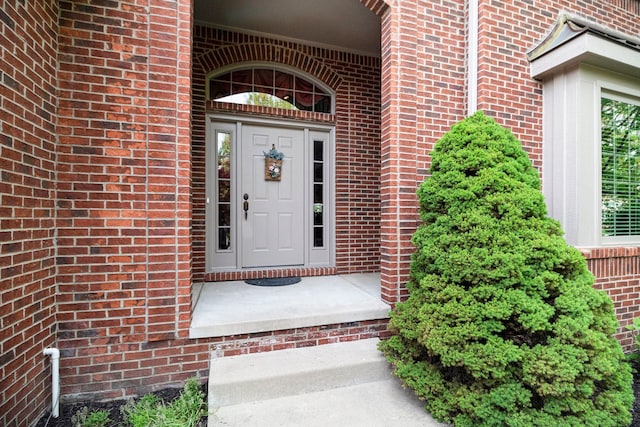 24391 Cavendish Ave E, Novi, MI 48375 - view of exterior entry with brick siding