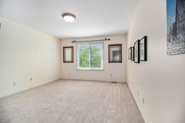 24391 Cavendish Ave E, Novi, MI 48375 - unfurnished room with light colored carpet and baseboards