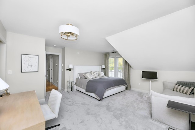 carpeted bedroom with baseboards