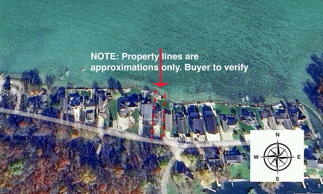 aerial view of property's location with nearby suburban area