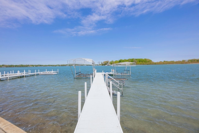dock area with a water view