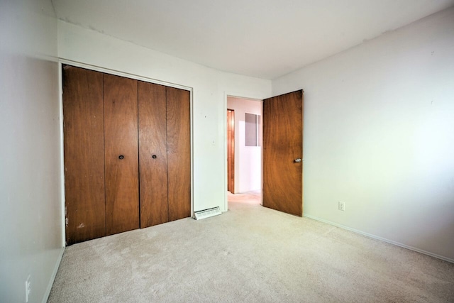 11837 Meteor Dr, Sterling Heights, MI 48313 - unfurnished bedroom with carpet floors, a closet, and baseboards