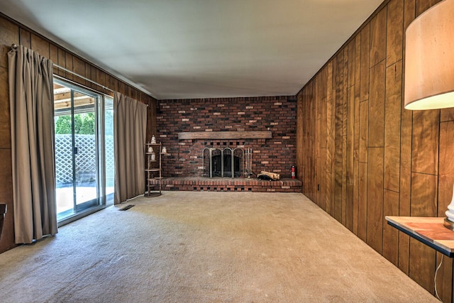 11837 Meteor Dr, Sterling Heights, MI 48313 - unfurnished living room featuring carpet floors, wood walls, and a brick fireplace
