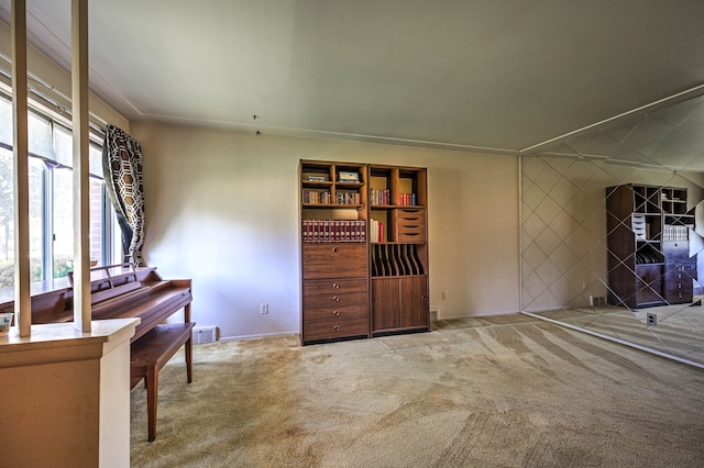 11837 Meteor Dr, Sterling Heights, MI 48313 - unfurnished living room featuring carpet flooring, baseboards, and crown molding