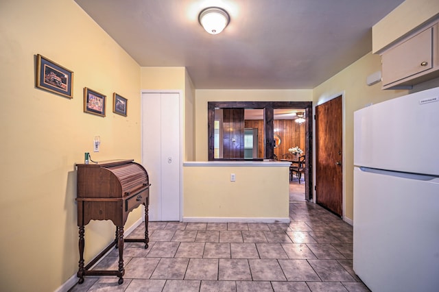 11837 Meteor Dr, Sterling Heights, MI 48313 - kitchen with freestanding refrigerator, tile patterned floors, and baseboards