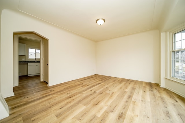empty room with light wood-style flooring