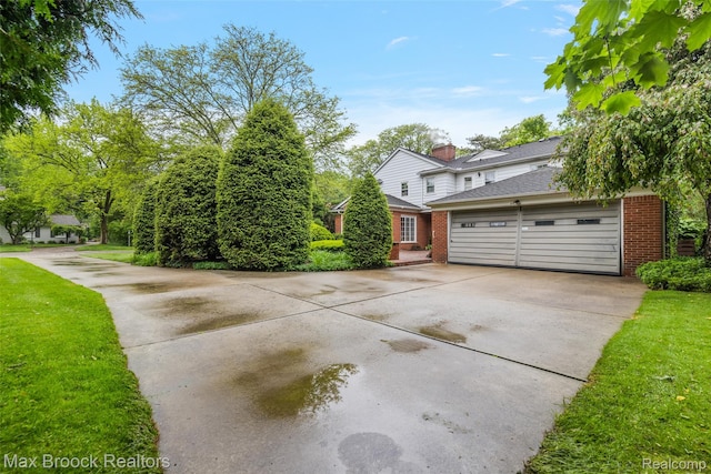 3287 Bradway Blvd, Bloomfield Hills, MI 48301 - view of front of home featuring brick siding, concrete driveway, and a front yard