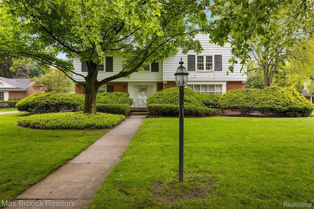 3287 Bradway Blvd, Bloomfield Hills, MI 48301 - view of front of home featuring brick siding and a front lawn