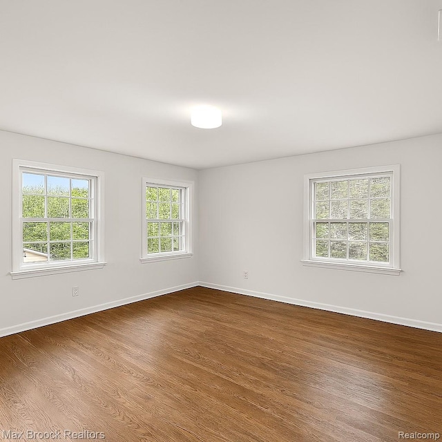 3287 Bradway Blvd, Bloomfield Hills, MI 48301 - spare room with wood finished floors and baseboards