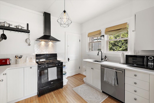 kitchen featuring black appliances, wall chimney exhaust hood, a sink, open shelves, and light countertops