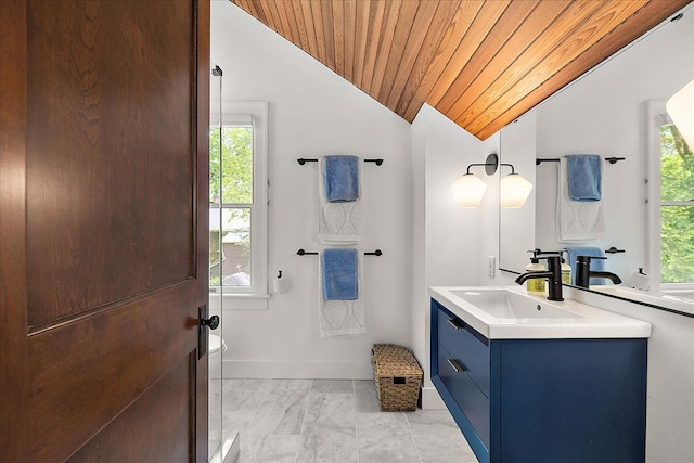 bathroom with lofted ceiling, healthy amount of natural light, wood ceiling, vanity, and marble look tiles