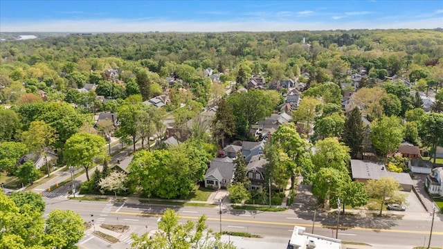 aerial view of residential area with a forest