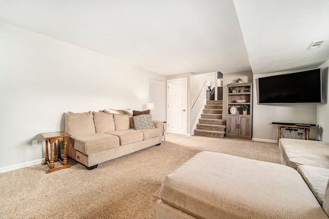 9703 Tower Rd, South Lyon, MI 48178 - living room with light carpet, baseboards, and stairs