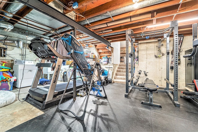 9703 Tower Rd, South Lyon, MI 48178 - exercise area with washing machine and dryer