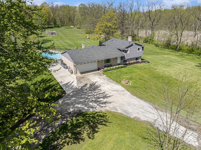 9703 Tower Rd, South Lyon, MI 48178 - view of subject property with a pool