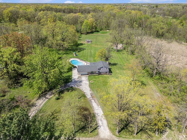 9703 Tower Rd, South Lyon, MI 48178 - aerial view of property and surrounding area featuring a forest and a pool