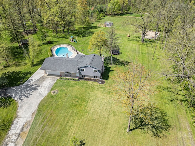 9703 Tower Rd, South Lyon, MI 48178 - view from above of property featuring a pool area