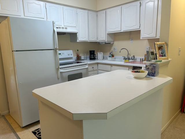 49936 Helfer Blvd Unit 8, Wixom, MI 48393 - kitchen with white appliances, a sink, under cabinet range hood, white cabinetry, and a peninsula