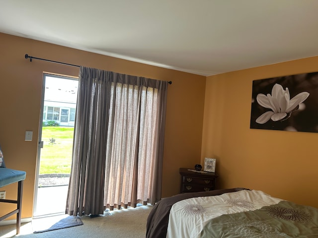 49936 Helfer Blvd Unit 8, Wixom, MI 48393 - bedroom with carpet flooring and access to exterior