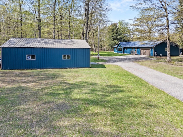 8869 E Hawley Rd, Hesperia, MI 49421 - view of outbuilding with driveway
