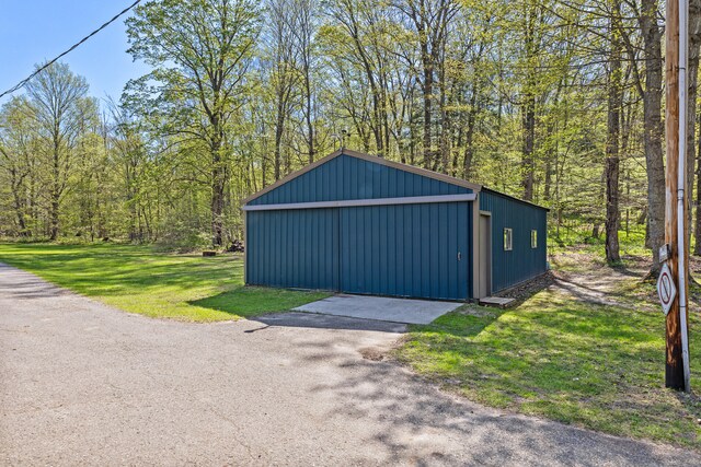 8869 E Hawley Rd, Hesperia, MI 49421 - view of outdoor structure with an outdoor structure and a forest view
