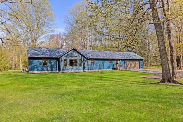 8869 E Hawley Rd, Hesperia, MI 49421 - view of front of property with asphalt driveway and a front yard
