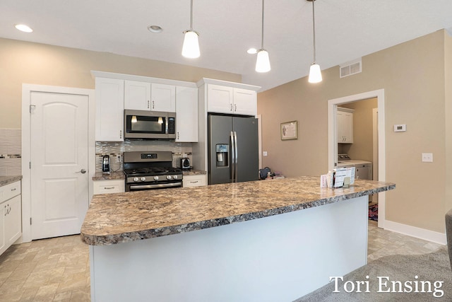 1026 Grosvenor Dr Unit 27, Greenville, MI 48838 - kitchen featuring stainless steel appliances, white cabinetry, backsplash, pendant lighting, and recessed lighting