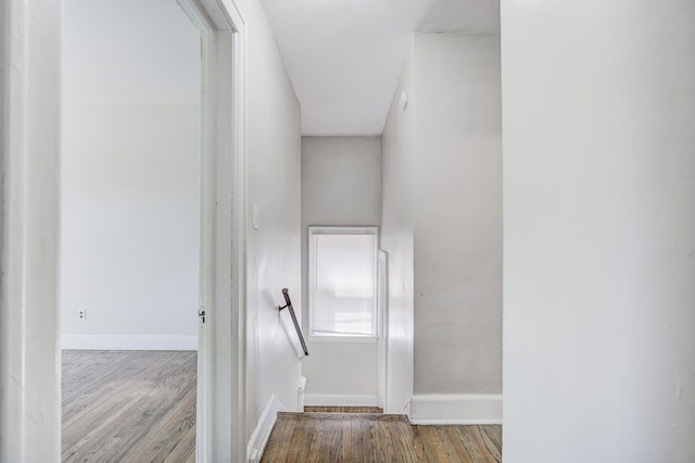 18613 Santa Rosa Dr, Detroit, MI 48221 - hallway featuring an upstairs landing, wood finished floors, and baseboards