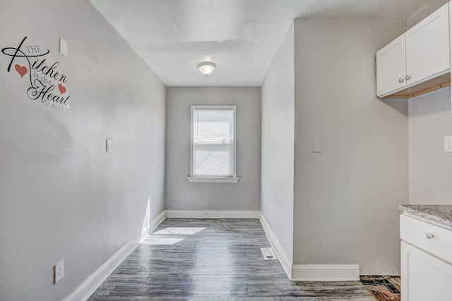 18644 Santa Rosa Dr, Detroit, MI 48221 - hallway featuring wood finished floors and baseboards