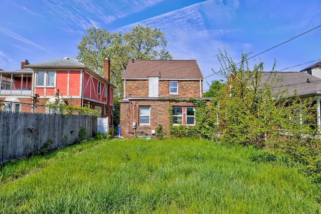 18644 Santa Rosa Dr, Detroit, MI 48221 - back of house featuring fence and brick siding
