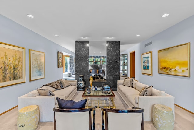 living room with baseboards, light colored carpet, recessed lighting, and healthy amount of natural light