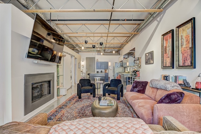 111 N Main St Unit 209, Royal Oak, MI 48067 - living room featuring a fireplace