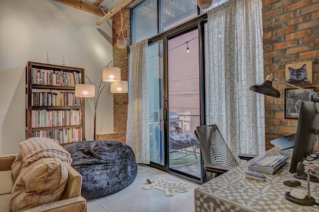 111 N Main St Unit 209, Royal Oak, MI 48067 - office space with brick wall, concrete floors, and a high ceiling