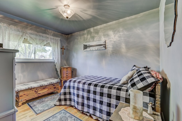 bedroom featuring wood finished floors