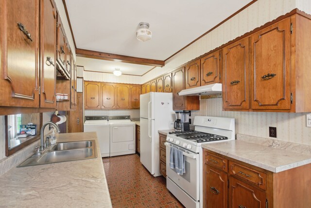 5427 Fiesta Pass, Grand Blanc, MI 48439 - kitchen featuring white appliances, independent washer and dryer, a sink, under cabinet range hood, and brick patterned flooring