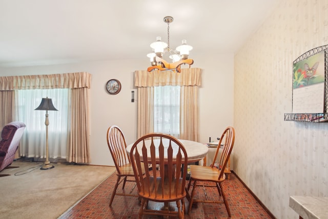 5427 Fiesta Pass, Grand Blanc, MI 48439 - dining area featuring brick floors, a chandelier, plenty of natural light, and wallpapered walls