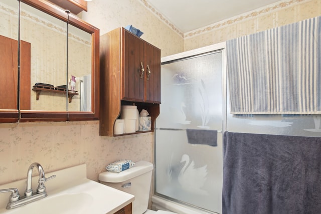 5427 Fiesta Pass, Grand Blanc, MI 48439 - full bathroom with wallpapered walls, toilet, enclosed tub / shower combo, and vanity