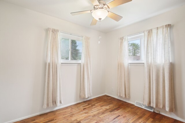 5427 Fiesta Pass, Grand Blanc, MI 48439 - empty room with light wood finished floors and ceiling fan