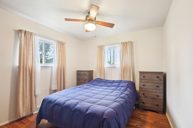 5427 Fiesta Pass, Grand Blanc, MI 48439 - bedroom featuring wood finished floors, ceiling fan, and baseboards