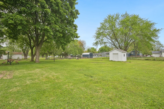 5427 Fiesta Pass, Grand Blanc, MI 48439 - view of yard featuring a shed and an outdoor structure