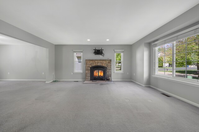 137 Donna, Waterford, MI 48327 - unfurnished living room with baseboards, a stone fireplace, carpet, and recessed lighting