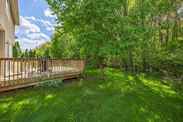 137 Donna, Waterford, MI 48327 - view of grassy yard featuring a wooden deck