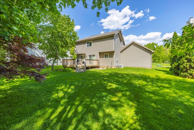 137 Donna, Waterford, MI 48327 - rear view of property with a wooden deck, a yard, and central air condition unit
