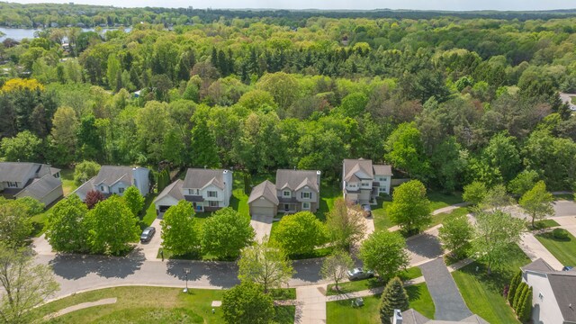 137 Donna, Waterford, MI 48327 - aerial view of residential area with a heavily wooded area