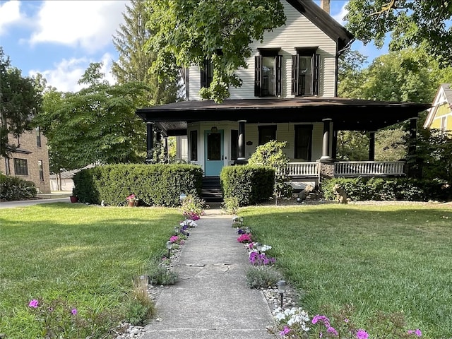 529 Fountain St NE, Grand Rapids, MI 49503 - view of front of house with covered porch and a front lawn