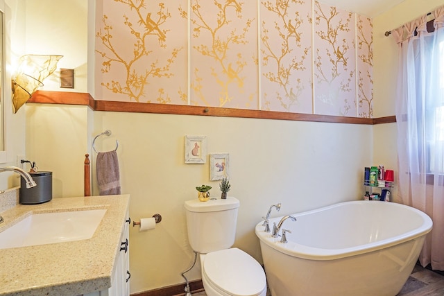 529 Fountain St NE, Grand Rapids, MI 49503 - bathroom with a soaking tub, toilet, and vanity